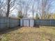 Utility shed in a large backyard, offering additional storage space at 5512 Straw Hat Dr, Indianapolis, IN 46237