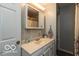 Bathroom features include a vanity with a mirror, cabinets and drawers, and shower with curtain at 5973 Masten Rd, Coatesville, IN 46121