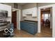 View of kitchen with appliances, cabinetry, and connection to dining area at 5973 Masten Rd, Coatesville, IN 46121