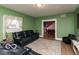 Inviting living room featuring a comfortable seating arrangement and a dining room view at 5973 Masten Rd, Coatesville, IN 46121