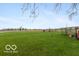 Expansive yard with lush green grass, chicken coop, and open space at 5973 Masten Rd, Coatesville, IN 46121