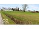 View of the yard showcasing the expansive green space surrounding the property at 5973 Masten Rd, Coatesville, IN 46121