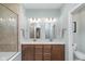 Bright bathroom featuring double vanity with stylish mirrors and lighting, offering a modern and functional space at 622 Ehrlich Ln, Westfield, IN 46074