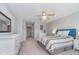 Comfortable bedroom featuring soft carpet, neutral walls, and ample closet space for organized living at 622 Ehrlich Ln, Westfield, IN 46074