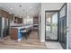 Open kitchen featuring stainless steel appliances, breakfast bar and ample counter space at 622 Ehrlich Ln, Westfield, IN 46074