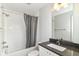 The bathroom has a tub and shower, a sink with a vanity, a mirror, and modern fixtures at 64 Central Greens Blvd, Indianapolis, IN 46222