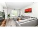 Inviting living room with comfortable sectional sofa and stylish decor at 64 Central Greens Blvd, Indianapolis, IN 46222