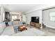 Bright living room with open layout flowing into dining area and kitchen at 64 Central Greens Blvd, Indianapolis, IN 46222