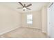 This bedroom features a ceiling fan and plush carpeting, perfect for relaxation at 6467 W Whispering N Way, Greenfield, IN 46140