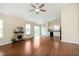 Bright open concept living area boasts a fireplace and seamless access to the backyard at 6467 W Whispering N Way, Greenfield, IN 46140