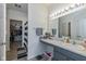 Bright bathroom with single sink vanity, a mirror, and a shower with curtain at 6535 Heben Ct, Indianapolis, IN 46113