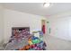 Neutral bedroom with carpet, a large closet, and a bright ceiling light at 6535 Heben Ct, Indianapolis, IN 46113