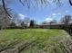 Spacious backyard featuring a fire pit and plenty of space for outdoor activities at 6672 E 225 S, Whitestown, IN 46075
