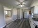 Clean, updated kitchen with white cabinets and modern appliances at 6672 E 225 S, Whitestown, IN 46075