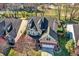 Aerial view of the house showing the roof, dormer windows, and front yard at 6869 W Winding, McCordsville, IN 46055