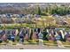 Aerial view of the neighborhood, showcasing a residential street with houses at 6869 W Winding, McCordsville, IN 46055
