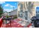 View of the red back deck, patio door, and backyard at 6869 W Winding, McCordsville, IN 46055