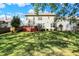 Expansive backyard boasts lush lawn and deck perfect for outdoor entertaining at 6869 W Winding, McCordsville, IN 46055