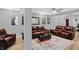 Basement recreational area featuring comfortable leather seating, an accent rug, and ambient lighting at 6869 W Winding, McCordsville, IN 46055
