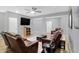 Basement recreational area featuring modern entertainment system and comfortable leather seating at 6869 W Winding, McCordsville, IN 46055