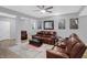 Basement recreational area featuring comfortable leather seating, ambient lighting, and modern design at 6869 W Winding, McCordsville, IN 46055
