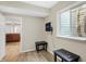 Finished basement view with wood floors and a doorway leading to a living room at 6869 W Winding, McCordsville, IN 46055