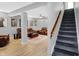 Finished basement offers a recreational area with leather seating and a stylish coffee table at 6869 W Winding, McCordsville, IN 46055