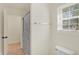 Bright bathroom with a walk-in shower and a large window that allows natural light into the room at 6869 W Winding, McCordsville, IN 46055
