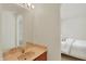 Bathroom with modern mirror, vanity lighting, and a peach-toned sink at 6869 W Winding, McCordsville, IN 46055