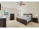 Spacious bedroom featuring neutral carpet, a ceiling fan and large windows for natural light at 6869 W Winding, McCordsville, IN 46055
