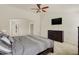 Comfortable bedroom featuring a mounted TV, dresser, and spacious layout at 6869 W Winding, McCordsville, IN 46055