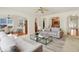 Spacious living room featuring neutral decor, an area rug, and lots of natural light at 6869 W Winding, McCordsville, IN 46055