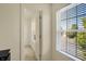 Bright walk-in closet featuring natural light from a large window and ample storage with white shelving at 6869 W Winding, McCordsville, IN 46055