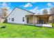 A spacious backyard and patio is perfect for entertaining guests at 701 Downing Dr, Greenwood, IN 46143