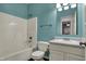 Cozy bathroom featuring a shower/tub combination and a single vanity at 701 Downing Dr, Greenwood, IN 46143