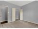 Bedroom featuring neutral walls and carpet with a closet at 701 Downing Dr, Greenwood, IN 46143
