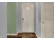 A simple entryway with painted walls and a white front door at 701 Downing Dr, Greenwood, IN 46143