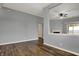 Spacious living room with hardwood floors, neutral walls, and an open layout design at 701 Downing Dr, Greenwood, IN 46143