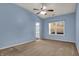 Large main bedroom featuring a window for natural light and an ensuite bathroom at 701 Downing Dr, Greenwood, IN 46143