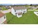 Aerial view of home's backyard with a shed, fence, and patio at 7048 Millet Ln, Avon, IN 46123