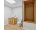Bathroom with a unique sink, toilet, and built-in shelving unit at 7048 Millet Ln, Avon, IN 46123