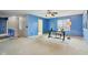 Bright bedroom featuring blue walls, carpet flooring, and a ceiling fan at 7048 Millet Ln, Avon, IN 46123