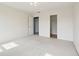 A bright bedroom with two doors at 7048 Millet Ln, Avon, IN 46123