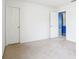 A bright bedroom with two doors at 7048 Millet Ln, Avon, IN 46123