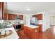 Well-equipped kitchen with modern appliances and a functional center island design at 7048 Millet Ln, Avon, IN 46123