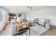 Spacious living area with hardwood floors, modern furnishings, and an open layout at 7048 Millet Ln, Avon, IN 46123