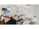 Open-concept living space featuring stylish decor, wood flooring, and natural light at 7048 Millet Ln, Avon, IN 46123