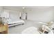Bright and airy main bedroom with neutral decor, ceiling fan and carpet flooring at 7048 Millet Ln, Avon, IN 46123