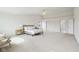 Expansive main bedroom featuring neutral tones, carpet flooring and natural light at 7048 Millet Ln, Avon, IN 46123