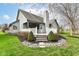 Well landscaped back yard with rock garden at 7242 River Glen Dr, Fishers, IN 46038